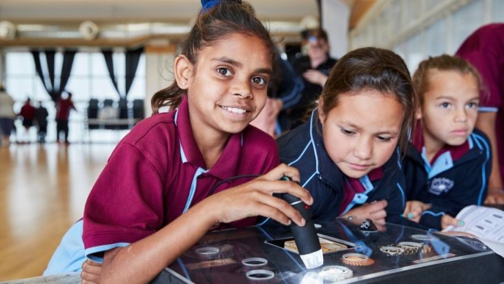 Opportunity_classes_20215 Two students look at forensic science artefacts